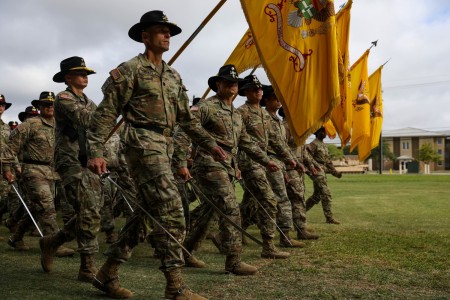 Troopers within the 1st Cavalry Division march in formation during a ceremony in celebration of the 101st birthday of the 1st Cavalry Division at Fort Hood, Texas, Sept. 16, 2022.