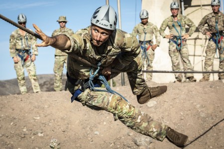 Service members assigned to Task Force Red Dragon and Combined Joint Task Force Horn of Africa participate in the French Desert Commando Course at Arta Range complex, Djibouti, April 26, 2022.