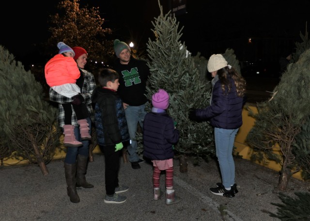 Tagged with holiday messages and ornaments, over 300 Trees for Troops find homes with service members and their Families at the annual Fort Knox Tree Lighting Ceremony Dec. 1, 2022.