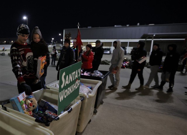 Members of 19th Engineer Battalion ruck hundreds of toys and deliver them to Santa’s Workshop Dec. 1, 2022 as part of post efforts to collect Christmas gifts for children of Fort Knox Families in need.