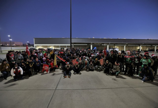 Members of 19th Engineer Battalion ruck hundreds of toys and deliver them to Santa’s Workshop Dec. 1, 2022 as part of post efforts to collect Christmas gifts for children of Fort Knox Families in need.