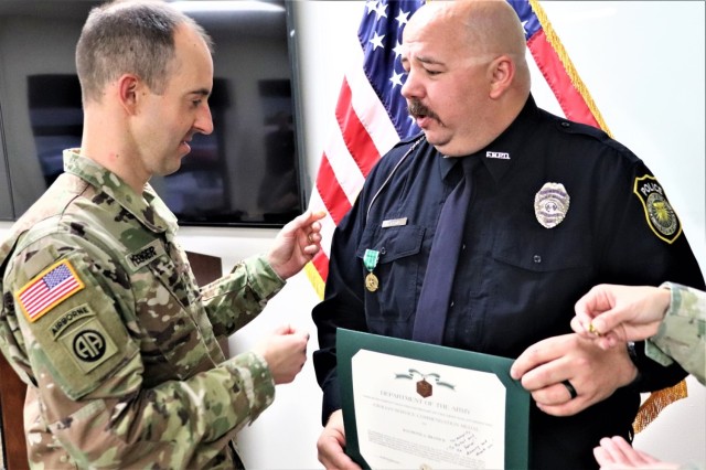Fort McCoy police officer receives medal for heroic rescue effort while off duty