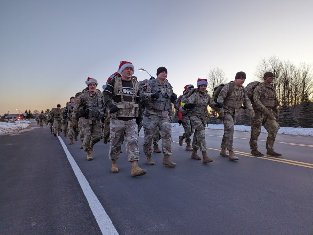 Fort Drum NCOs march on a mission to deliver a “Mountain of Toys”