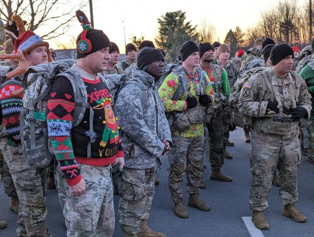 Fort Drum NCOs march on a mission to deliver a “Mountain of Toys”
