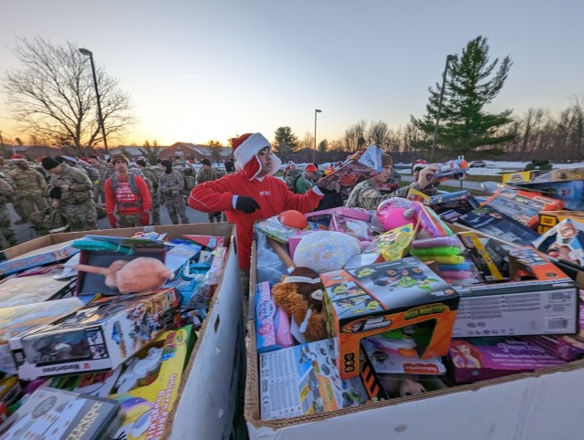 Fort Drum NCOs march on a mission to deliver a “Mountain of Toys”