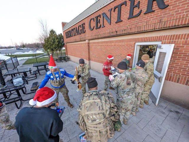 Fort Drum NCOs march on a mission to deliver a “Mountain of Toys”