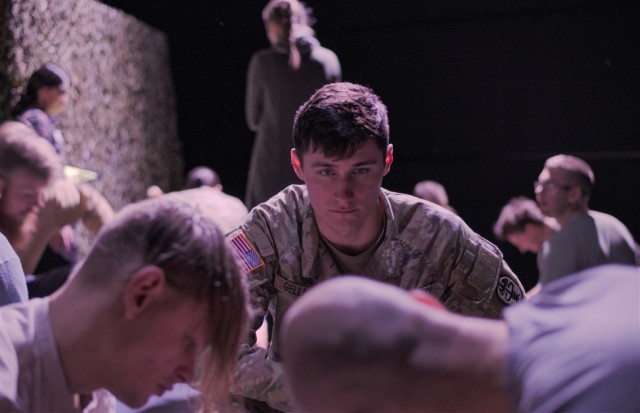 A U.S. Army medical soldier oversees medical training of NATO military medical personnel.