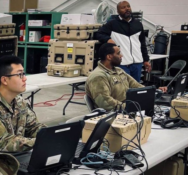 Soldiers learning the Wide Area Voice Environment application.