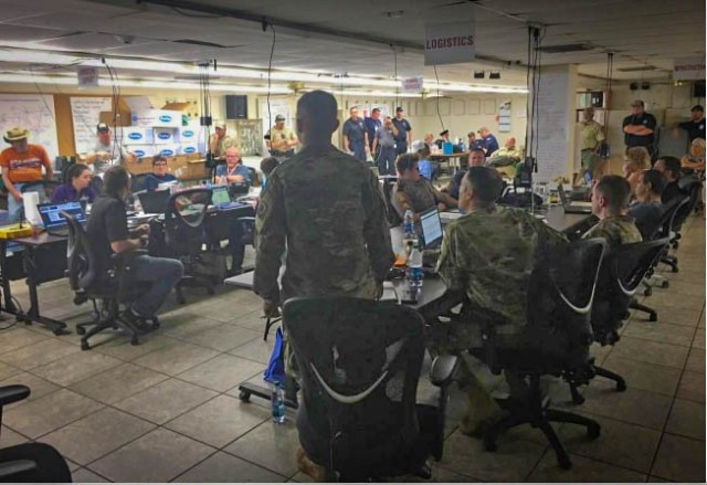 A Soldier reporting DIRECT status to the Emergency Operations Center (EOC) floor in Calhoun County,
