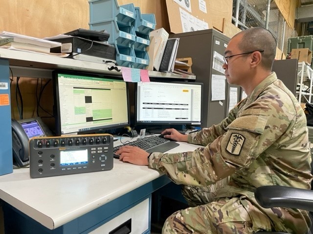Staff Sgt. Gandhi Tuazon, assigned to the 549th Hospital Center, reviews a quote from industry to positively identify component shortages to facilitate a
property lateral transfer within Global Combat Support System — Army on March 17, 2022. 