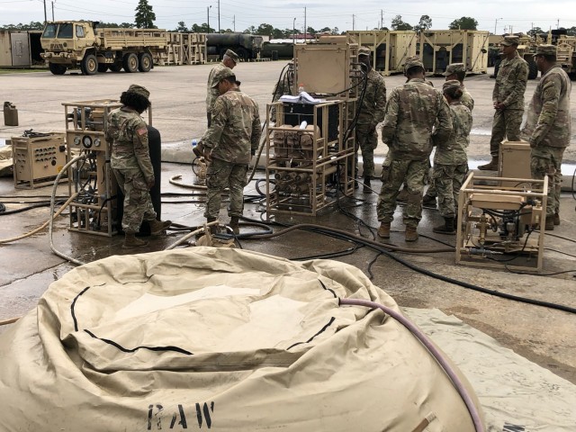 Quartermaster and Chemical Equipment repairers and Tactical Power Generation specialists conduct technical inspections on Lightweight Water Purification Systems to build equipment readiness at Fort Stewart, Georgia, on Oct. 6, 2022. 