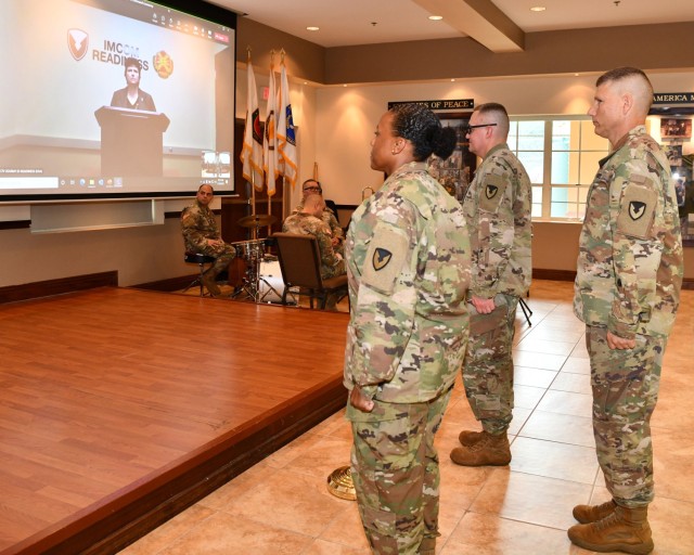 (L to R) Via Microsoft Teams, Installation Management Command (IMCOM) Readiness Director Brenda Lee McCullough, former Fort Buchanan Garrison Commander Col. Tomika M. Seaberry; New Garrison Commander Col. Charles N. Moulton and Garrison Command Sgt. Maj. Roderick W. Hendricks upon completion of the Garrison Change of Command.