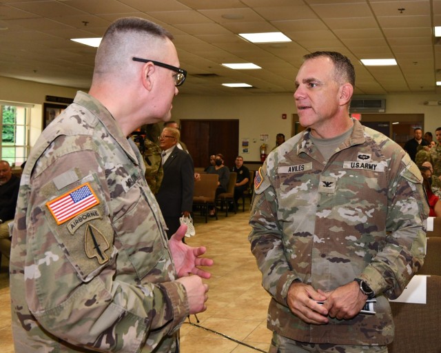 (L to R) Before commencement of the Fort Buchanan Change of Command Ceremony, incoming Garrison Commander Col. Charles N. Moulton speaks with 1st Mission Support Command Chief of Staff Col. Richard Avilés.