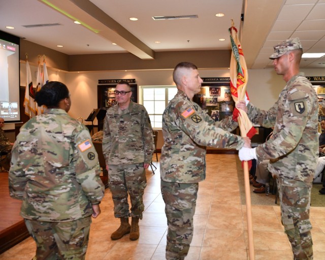 Fort Buchanan Garrison Command Sgt. Maj. Roderick W. Hendricks the Senior Enlisted Noncommissioned Officer in the Garrison Command and Principal Advisor to the Garrison Commander, as custodian of the Garrison Colors, receives the flag, carrying out the time-honored passing of the colors, symbolizing the change of command from one commander to another, an important enactment of an Army tradition that is 247 years old. 