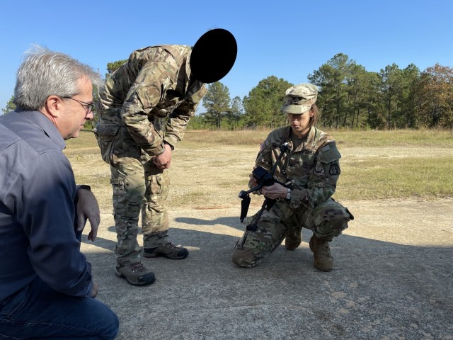 Col. Danielle Medaglia, project manager for the Unmanned Aircraft Systems project office, inspects a RQ-28A Short Range Reconnaissance system with an unidentified soldier from the 3rd Battalion, 75th Ranger Regiment at Fort Benning, GA.
