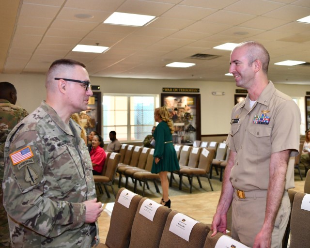 (L to R) Incoming Fort Buchanan Garrison Commander Col. Charles N. Moulton met Naval Reserve Center PR Commanding Officer Cdr. David F. Zerda for the first time.