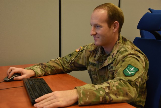 Maj. Steven Hansen, Allied Land Command G9, engages with the training audience virtually during Exercise Loyal Leda 2022 in Bydgoszcz, Poland. The 10-day combat readiness evaluation exercise hosted at the NATO Joint Force Training Centre was an Allied Land Command-sponsored, land domain, tactical level, virtual command post exercise held from Nov. 30 to Dec. 9. Allied Land Command is based in Izmir, Turkiye.