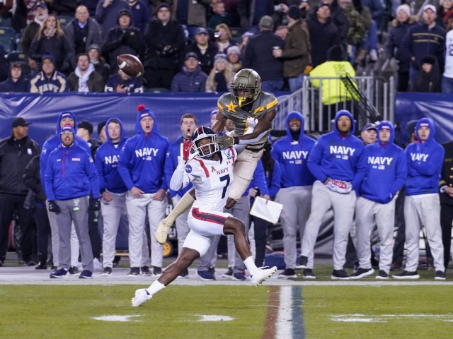 Army sophomore wide receiver Isaiah Alston goes up for the catch but is defended by Navy sophomore cornerback Mbiti Williams Jr. during the 123rd Army-Navy game Dec. 10, 2022. 