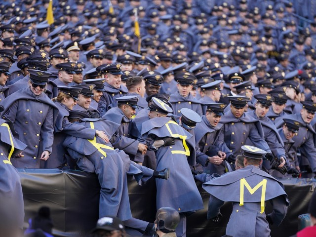 Cadets jump into the crowd following the student exchange ceremony at Lincoln Financial Field prior to the 123rd Army-Navy football game Dec. 10, 2022.