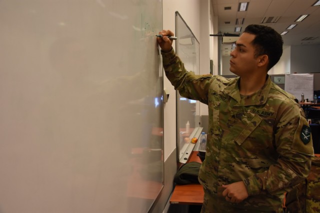 Sgt. Christian Martinez, Allied Land Command G3, records information on a white board during Exercise Loyal Leda 2022 in Bydgoszcz, Poland. The 10-day combat readiness evaluation exercise hosted at the NATO Joint Force Training Centre was an Allied Land Command-sponsored, land domain, tactical level, virtual command post exercise held from Nov. 30 to Dec. 9. Allied Land Command is based in Izmir, Turkiye.