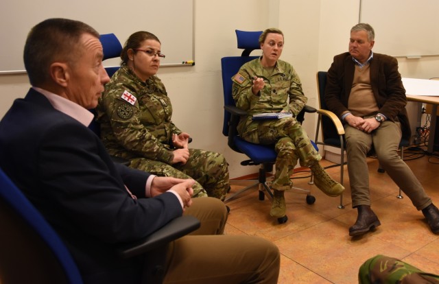 Lt. Col. Jennifer Gotie, JFTC Training Division, coordinates activities in a Grey Cell meeting during Exercise Loyal Leda 2022 in Bydgoszcz, Poland. The 10-day combat readiness evaluation exercise hosted at the NATO Joint Force Training Centre was an Allied Land Command-sponsored, land domain, tactical level, virtual command post exercise held from Nov. 30 to Dec. 9.