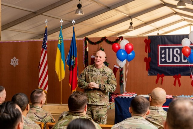 U.S. Army Brig. Gen. Joseph E. Hilbert, commanding general of 7th Army Training Command, speaks to Soldiers assigned to Task Force Orion, 27th Infantry Brigade Combat Team, New York Army National Guard, during a celebration of the 386th National Guard birthday in Grafenwohr, Germany, Dec. 13, 2022. The formation of the first militia regiments in North America on December 13, 1636 are recognized as the birth of the National Guard, and are celebrated by Guard units from the 54 U.S. states and territories serving domestically and deployed around the world. 