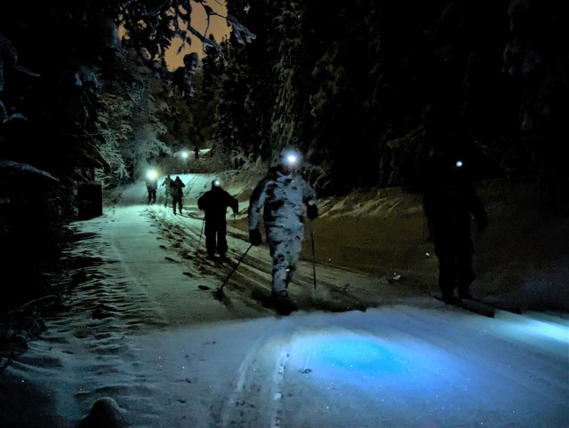 Members of the Germany Army participate in a pre-dawn ski session in the vicinity of Fort Wainwright, Alaska, with soldiers from 3rd Battalion, 21st Infantry Regiment. The representatives of the Bundeswehr are visiting Alaska to enhance relationships between the two nations and explore training opportunities in the region. (US Army photo by Eve Baker, Fort Wainwright Public Affairs Office)