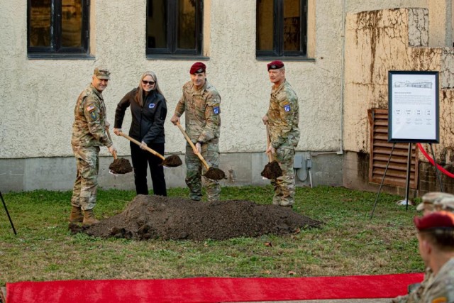  (Right side) U.S. Army Lt. Gen. Chris T. Donahue and Command Sgt. Maj. T.J. Holland, the command team for the XVIII Airborne Corps and Fort Bragg, along with Col. John Wilcox, Fort Bragg Garrison commander, and other distinguished guests take part in the ceremonial groundbreaking of the Innovation Outpost marking the beginning of construction Dec, 13. The construction of the Innovation Outpost demonstrates Fort Bragg’s commitment to innovation by providing all units with a collaborative space to promote a data-centric culture. (U.S Army photo by Sgt. Daniel Ramos.)