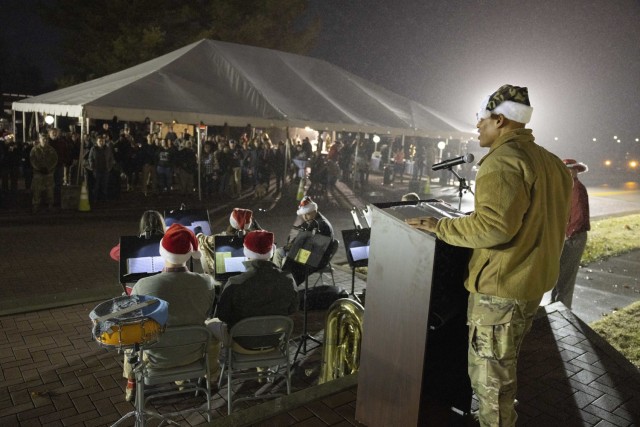 Maj. Gen. Michel M. Russell Sr., commanding general, 1st Theater Sustainment Command, speaks to Soldiers, civilians, and family members at the holiday tree lighting social, Dec. 9, 2022, at Fort Knox, Kentucky.