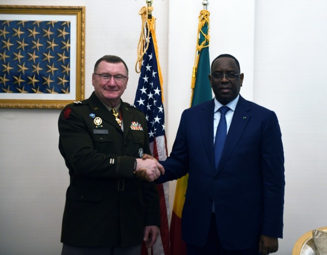 President Macky Sall of the Republic of Senegal hosts Army Maj. Gen. Greg Knight, adjutant general, Vermont National Guard, Washington, D.C., Dec. 12, 2022. Senegal and Vermont are partnered in the Department of Defense National Guard State Partnership Program. (U.S. Army National Guard photo by Master Sgt. Jim Greenhill)