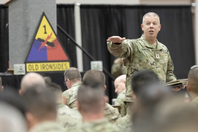 Brig. Gen. Michael Simmering, deputy commanding general - operations for 1st Armored Division, speaks to Soldiers between sessions during Iron Summit, a two-day leadership forum hosted by the 1st AD, at the El Paso Convention Center in El Paso, Texas, Dec. 14, 2022.