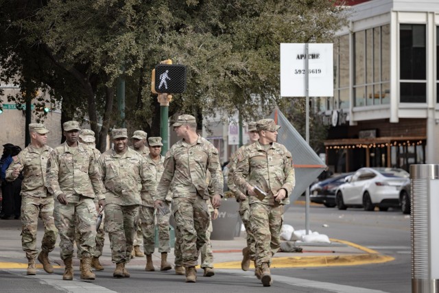 Soldiers from the 1st Armored Division and Fort Bliss on the move in downtown El Paso, Texas, Dec. 13, 2022. The 1st AD hosted the 2022 Iron Summit, a conference for Iron Soldier and partner unit leaders ranging from the company level to the brigade level, as well as local and regional civilian leaders, at the El Paso Convention Center. As part of their time downtown, Soldiers were encouraged to check out local eateries and chat with locals who have welcomed Soldiers and their families to the Borderland for more than three generations.
