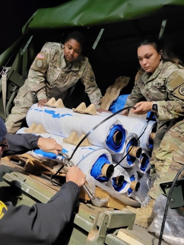 Louisiana National Guard men and women from the 165th CSSB, 139th Regional Support Group, delivered more than 2,000 tarps and 16,200 liters of water throughout Iberia, Jefferson, Orleans, St. Charles and Union Parishes after a severe storm with...