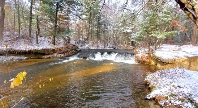 Snowy day at Fort McCoy&#39;s Trout Falls in Pine View Recreation Area