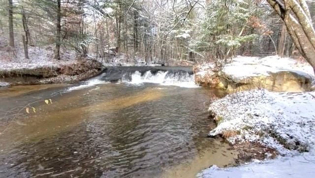 Snowy day at Fort McCoy&#39;s Trout Falls in Pine View Recreation Area