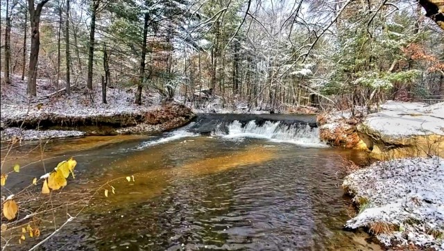 Snowy day at Fort McCoy&#39;s Trout Falls in Pine View Recreation Area