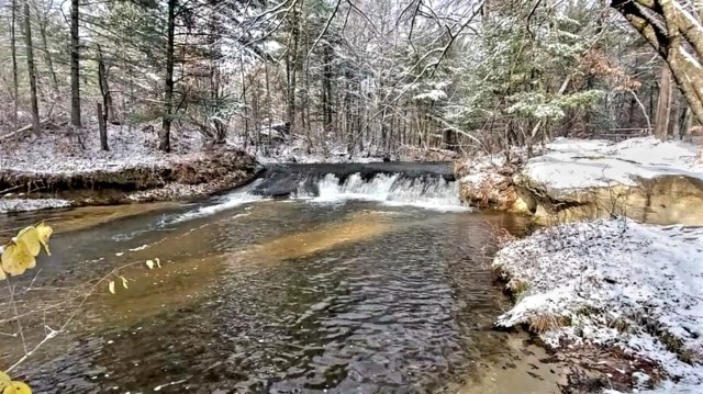Snowy day at Fort McCoy&#39;s Trout Falls in Pine View Recreation Area