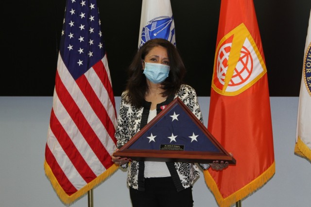 Adelina Cartagena, receives U.S. flag