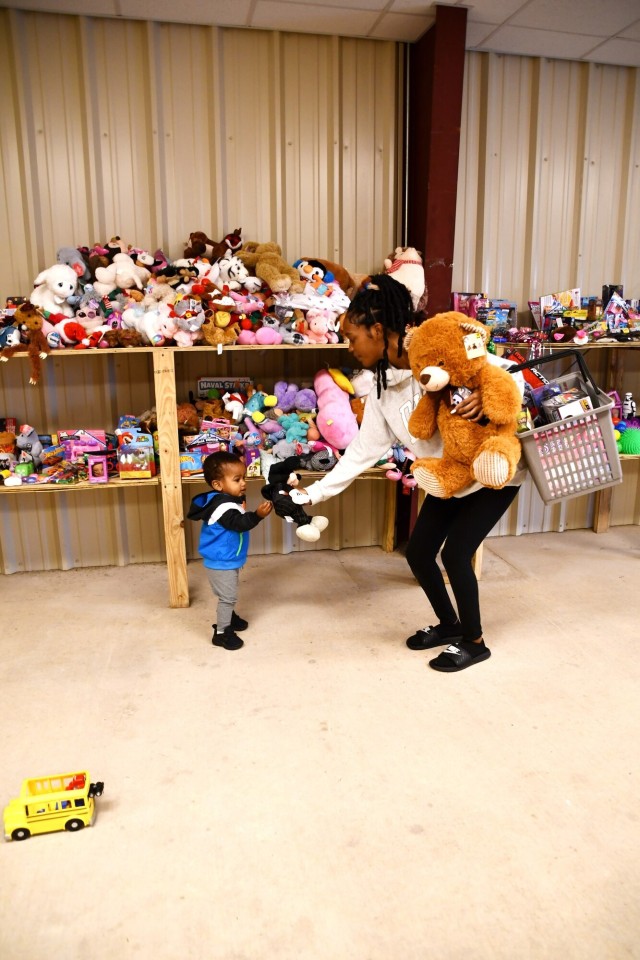 Gift giving embodies Christmas cheer by bringing toys, support