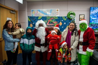 A fictional character came to life as Dr. Suess Grinch reached through the pages of a book and stepped onto the grounds of U.S. Army Garrison Humphreys...
