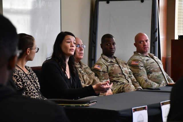 Panelists engage in discussion with Soldiers in the Headquarters Battalion