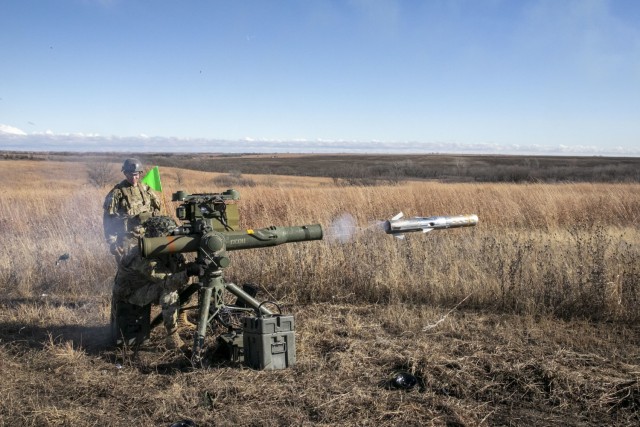 Soldiers with the Nebraska Army National Guard 1-134th Cavalry Squadron and 2-134th Infantry Battalion operate a TOW Missile System during a training exercise at Fort Riley, Kansas, Dec. 13, 2022. The unit was given 32 missiles and each Soldier was able to shoot at least twice.