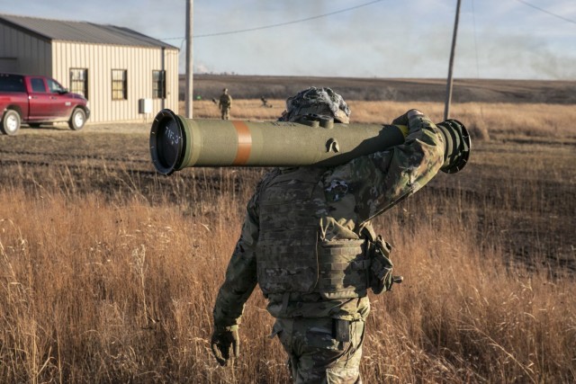 Soldiers with the Nebraska Army National Guard 1-134th Cavalry Squadron and 2-134th Infantry Battalion prepare to operate a TOW Missile System during a training exercise at Fort Riley, Kansas, Dec. 13, 2022. The unit was given 32 missiles and each Soldier was able to shoot at least twice. (U.S. Army National Guard photo by Sgt. Gauret Stearns)
