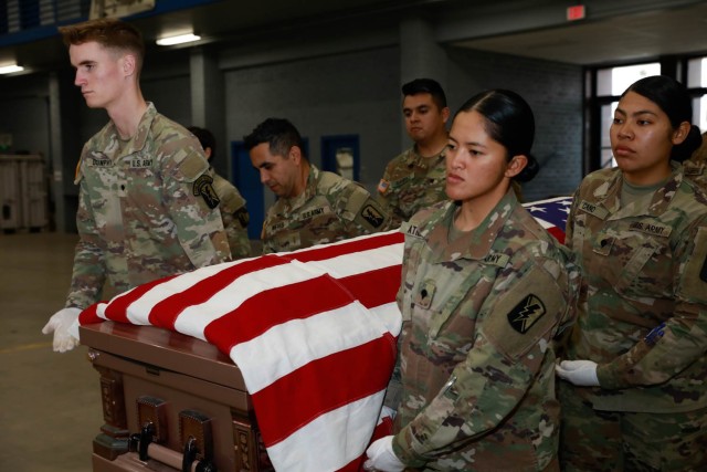 U.S. Army Soldiers with the California National Guard lift a casket during Cal Guard&#39;s Military Funeral Honors program week-long training course in San Diego, Dec. 17, 2022. The Soldiers were trained by U.S. Army Staff Sgt. Zaira Robinson, the state trainer for the program, and seven are now fully certified to perform military funeral honors throughout California. (U.S. Army National Guard photo by Sgt. 1st Class Kimberly Hill)