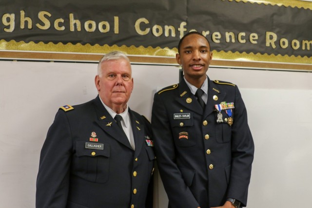 Lt. Col. (Ret.) Russell Gallagher and Army JROTC Cadet Kaheem Bailey-Taylor pose for a picture together following the award ceremony for the Medal of Heroism at Philadelphia Military Academy on January 6, 2023, in Philadelphia, PA. This award is the highest Department of the Army medal exclusively awarded to Army ROTC and JROTC Cadets. The medal is presented to those who perform an act of heroism where the &#34;acceptance of danger and extraordinary responsibilities, exemplifying praiseworthy fortitude and courage” are involved.