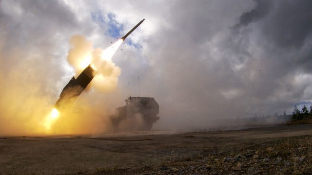 A U.S. Army M142 High Mobility Artillery Rocket System, from 3rd Battalion, 321 Field Artillery Regiment, attached to 41st Field Artillery Brigade, fires a rocket as part of Nordic Strike 22, at Vidsel Test Range, Sweden, Sept. 27, 2022.  The Army is putting new emphasis on using technology, including artificial intelligence and machine learning, to speed up the “kill chain” process of locating and firing on targets.