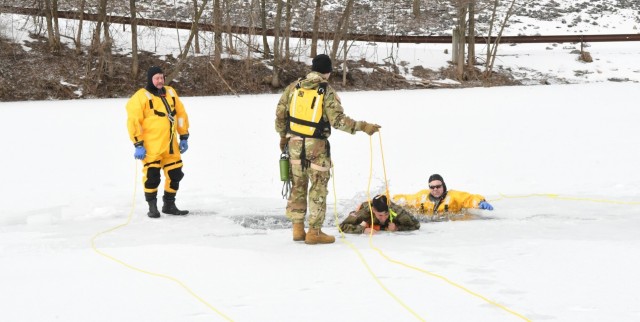 Fort Drum firefighters support sustainers during cold-water immersion training