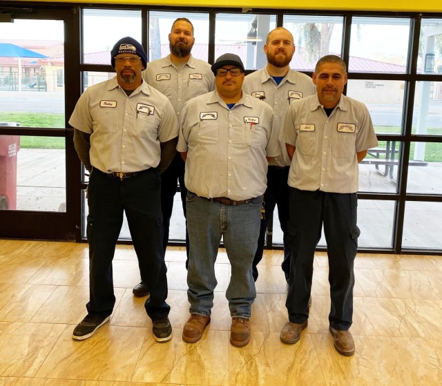 The housing team is made up of 10 employees: two grounds maintenance, one housekeeper, two office personnel and five maintenance technicians pictured. (Back, left to right) Matthew Bowie, Zach Zemeites (Front, left to right) Maintenance Supervisor...