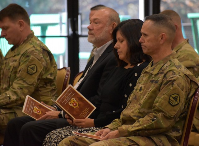 Command Sgt. Maj. Michael Starrett, right, Cyber Center of Excellence and Fort Gordon command sergeant major, attends the assumption of responsibility ceremony for Command Sgt. Maj. Linwood Barrett.
