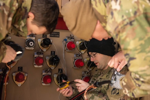 Sgt. Talon Lunsford, a Prime Power Specialist Course student, prepares to terminate a cable during a capstone event in December at the U.S. Army Prime Power School. The event gives students the opportunity to demonstrate all they have learned...